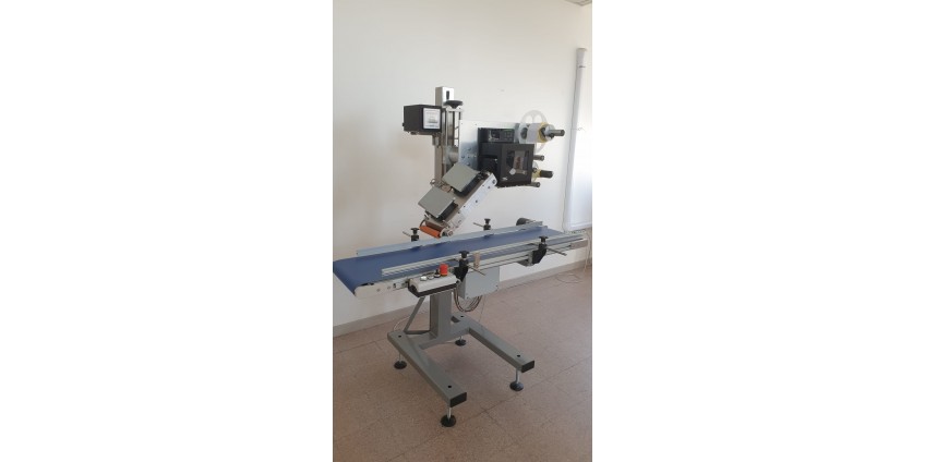 Pk-LINE-Belt-TTR-4V : stampa ed applica etichette su prodotti piani. Pk-LINE-Belt-TTR-4V : stampa ed applica etichette su prodotti piani.